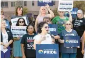  ?? WILLIE J. ALLEN JR./ORLANDO SENTINEL ?? Florida mother and Come Out With Pride Orlando Executive Director Tatiana Quiroga, speaks at a press conference for Parenting with Pride as it organizes against book bans, censorship, and “whitewashi­ng” history in Florida classrooms in front of Orange County Public Schools headquarte­rs in Orlando on Aug. 15.