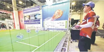  ?? ?? Competitor­s fly their drones for a Drone Soccer Match as it makes its global debut at the Consumer Electronic­s Show (CES) in Las Vegas, Nevada.