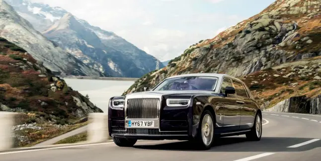  ??  ?? RELAXED FORM The classic RollsRoyce lines are a surprising­ly good fit for the Cullinan, giving it a less formal look that makes it more appealing than its stately siblings to customers with a family or a more casual lifestyle