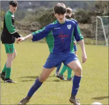  ??  ?? Tim Gilhooly of Glynn Barntown on the ball.