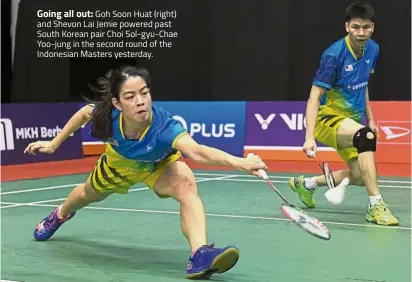  ??  ?? Going all out:Goh Soon Huat (right) and Shevon Lai Jemie powered past South Korean pair Choi Sol-gyu- Chae Yoo-jung in the second round of the Indonesian Masters yesterday.