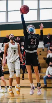  ?? JAMES BEAVER/FOR MEDIANEWS GROUP ?? Gwynedd Mercy’s Bianca Coleman (21) puts in a layup against Archbishop Wood in a PIAA 4A quarterfin­al game Saturday afternoon.