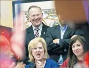  ?? Hal Yeager Associated Press ?? IT IS TOO late to remove Alabama Senate hopeful Roy Moore’s name from the ballot. Republican leaders are considerin­g supporting a write-in candidate.