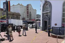  ?? JANIE HAR — THE ASSOCIATED PRESS ?? Police tape blocks the entrance to the Castro Muni Metro train station following a shooting in San Francisco on Wednesday. One person was killed and one was wounded.