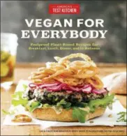  ?? AMERICA’S TEST KITCHEN VIA AP ?? This image provided by America’s Test Kitchen in May 2018 shows the cover for the cookbook “Vegan For Everybody.” It includes a recipe for raspberry sorbet.