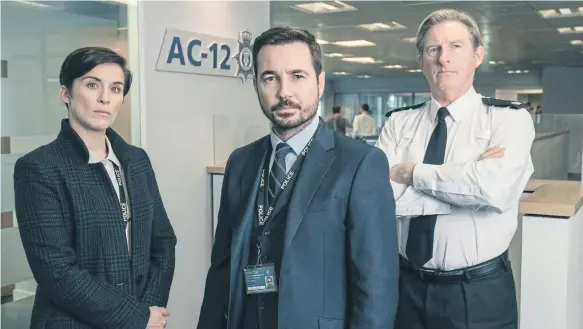  ?? ?? Vicky McClure in more familiar surroundin­gs – and sporting her signature crop – in Line of Duty with Martin Compston and Adrian ‘Jesus, Mary, Joseph and the wee donkey’ Dunbar. Pic: Aiden Monaghan/ World Production­s/ BBC/PA Wire