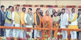  ?? HT PHOTO ?? ■ Chief minister Yogi Adityanath and other BJP leaders at a rally in Shahjahanp­ur on Sunday.
