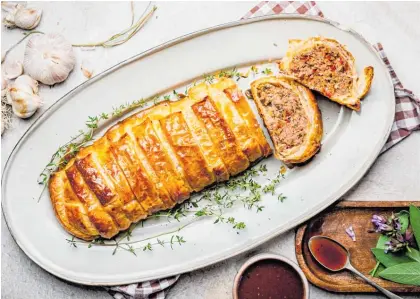  ?? ?? Say goodbye to supermarke­t sausage rolls with this impressive giant version.