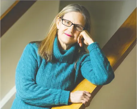  ?? DARREN BROWN FILES ?? Linda Duxbury, a professor at Carleton University’s Sprott School of Business, seen at home in 2015, says working from home isn’t a good setup for some people — those who share space with spouses and kids, at least until schools reopen.