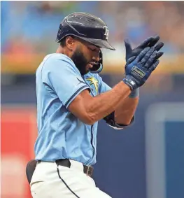  ?? NATHAN RAY SEEBECK/USA TODAY ?? The Tampa Bay Rays’ Amed Rosario celebrates his RBI triple against the Los Angeles Angels on Thursday in St. Petersburg, Fla.