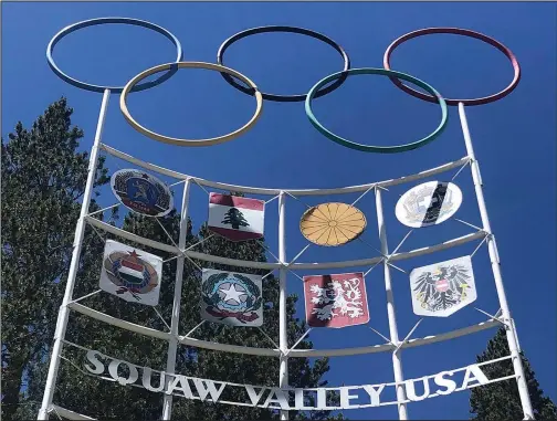  ?? ?? The Olympic rings stand atop a sign July 8, 2020, at the entrance to what was then called the Squaw Valley Ski Resort in Olympic Valley, Calif. In 2021, the resort changed its name to Palisades Tahoe.
(File Photo/ap/haven Daley)