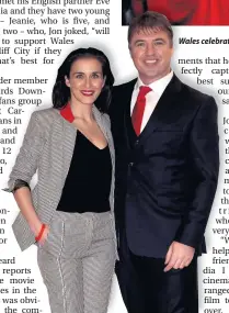  ??  ?? Wales celebrat celebrate after beating Belgium last July. Inset left, filmmaker Jonny Owen and partner, actress Vicky McClure