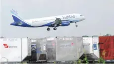  ?? — AFP ?? An aircraft of Indian airline Indigo lands at Indira Gandhi Internatio­nal Airport in New Delhi.