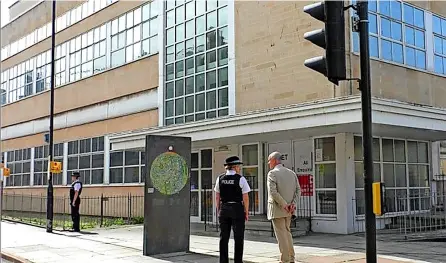  ?? ?? Chief Constable Sarah Crew and Police and Crime Commission­er Mark Shelford outside Plymouth House, a disused office block on Monmouth Street