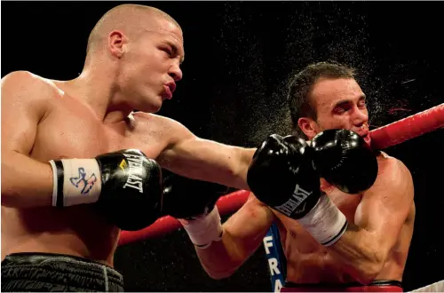  ?? Photo: CRAIG WILLIAMSON/ SNS GROUP/GETTY IMAGES ?? THE POWER: Hall catches Paisley’s Kris Carslaw with a crunching left hook in 2011