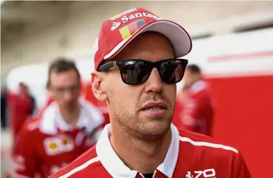  ??  ?? If Ferrari’s Sebastian Vettel retires during the Mexican Grand Prix, Mercedes’ Lewis Hamilton will be world champion. — AFP All over: