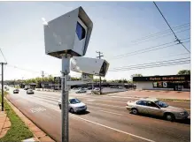  ?? LISA POWELL / STAFF ?? Traffic cameras have been used across Ohio since 2002. Opponents see them as automated speed traps and want the Ohio Supreme Court to decide on their legality. Supporters say they improve road safety.