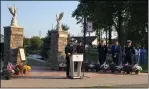  ??  ?? Avon Fire Chief David Swope speaks about the Sept. 11, 2001, terror attacks in New York and Washington during an observance in Avon.