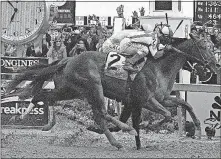  ?? ASSOCIATED PRESS] [MIKE STEWART/THE ?? Cloud Computing, foreground, crosses the finish line in the Preakness Stakes just ahead of Classic Empire.