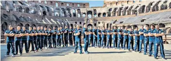  ??  ?? Forza Italia: The Italian Six Nations squad, who face England in Rome on Sunday, line up at the Colosseum