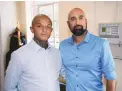  ?? DAVID ZALUBOWSKI/ASSOCIATED PRESS ?? Kyle Vinson, left, stands with his attorney Qusair Mohamedbha­i, on Aug. 4, 2021, in Denver. Aurora Police officer John Haubert is on trial over a violent arrest of Vinson.