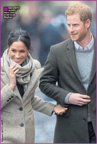  ??  ?? SECURITY ALERT: Harry and bride-to-be Meghan