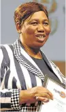  ??  ?? STUDYING REPORT: Minister of Basic Education Angie Motshekga