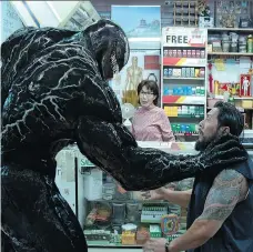  ?? COLUMBIA PICTURES ?? Tom Hardy’s Eddie Brock, a muckraking journalist turned scary monster, must fend off the alien possessing him in Venom.