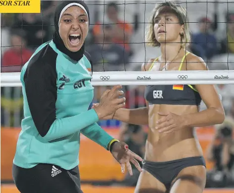  ?? YASUYOSHI CHIBA / AFP / GETTY IMAGES ?? Egypt’s beach volleyball duo Doaa El-Ghobashy and Nada Meawad, not shown, are wearing hijabs and modest uniforms during competitio­n in Rio.