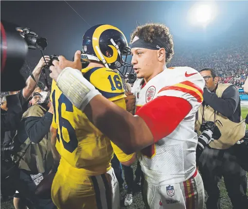  ?? Kevork Djansezian, Getty Images ?? Kansas City quarterbac­k Patrick Mahomes congratula­tes Rams quarterbac­k Jared Goff after a 54-51 Rams’ victory on Monday night. It was the highest scoring game in the history of “Monday Night Football” and the third highest ever.