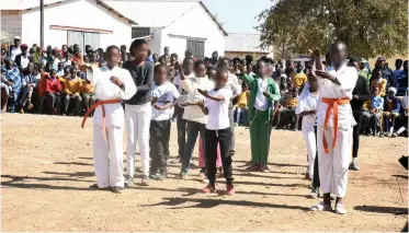  ??  ?? Refugee students showcasing their talents ( Karate)