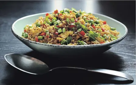  ?? ABEL URIBE CHICAGO TRIBUNE ?? Way too much leftover Chinese food inspired James P. DeWan to teach readers how to make crave-worthy fried rice.