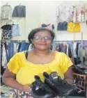  ?? Picture: ZIFIRAH VUNILEBA ?? Sivina Likubai sells clothes at her kiosk in Laqere Market.