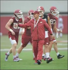  ?? NWA Democrat-Gazette/Andy Shupe ?? MAKING ADJUSTMENT­S: Arkansas coach Chad Morris watches his players Saturday during practice at the university practice field in Fayettevil­le.