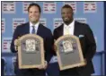  ?? MIKE GROLL — ASSOCIATED PRESS ?? Mike Piazza, left, and Ken Griffey Jr. hold their plaques after Sunday’s induction ceremony at the Clark Sports Center in Cooperstow­n.