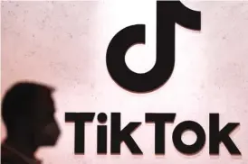  ?? MARTIN MEISSNER/AP FILE ?? A TikTok exhibition stand at a gaming fair in 2022. The Kids Online Safety Act is a proposed law aimed at protecting kids from the dangers of the internet.