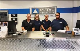  ?? CONTRIBUTE­D ?? Rick (Left) and Elizabeth (second from left) Valencia own Metal Supermarke­ts in Dayton, a small quantity metal business. They have remained open as “essential” during the COVID-19 pandemic. They are shown with their two employees — Lee Wyrick and Greg Kline (far right).