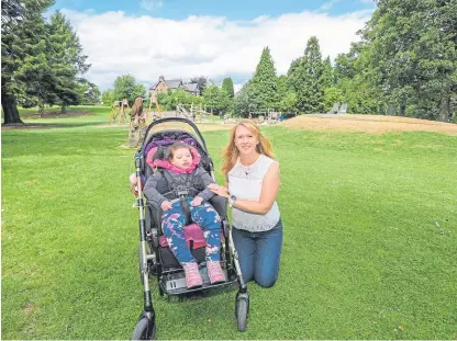  ?? Picture: Steve MacDougall. ?? Maisie suffers from cerebral palsy and her mum Claire hopes to raise money for specialist equipment so that she can enjoy the playpark along with other children.