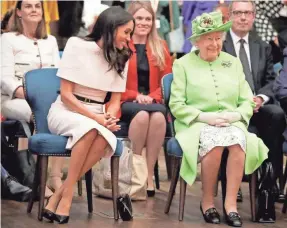  ?? PHIL NOBLE/AFP/GETTY IMAGES ?? Meghan, 37, appears to have adjusted well to life as a British royal – and to have won over Queen Elizabeth II.
