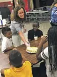  ??  ?? Virginia first lady Dorothy McAuliffe waits tables at a recent event with No Kid Hungry at the Richmond YMCA.