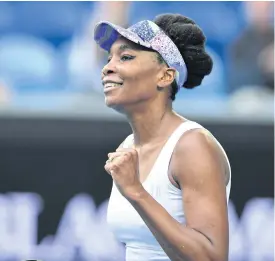  ??  ?? Venus Williams celebrates her victory against Duan Yingying.