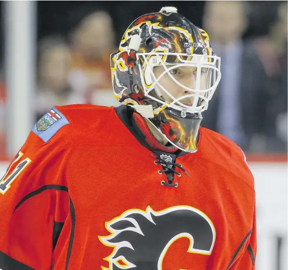  ??  ?? Dating back to his 27-save shutout against the Minnesota Wild on Nov. 15., Calgary Flames goalie Chad Johnson has posted an 11-3-0 record, a 1.82 goals-against average and a .939 save percentage. — MIKE DREW/POSTMEDIA NEWS FILES