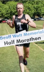  ??  ?? Peter Cutler crosses the line and sets a course record for the half marathon.