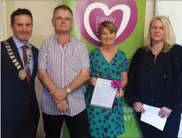  ??  ?? Cathaoirla­ch Cllr John Hegarty, Ciaran Barnes, Catherine Barnes and Susan Eccleston of Family Carers Wexford at the Family Resource Centre.