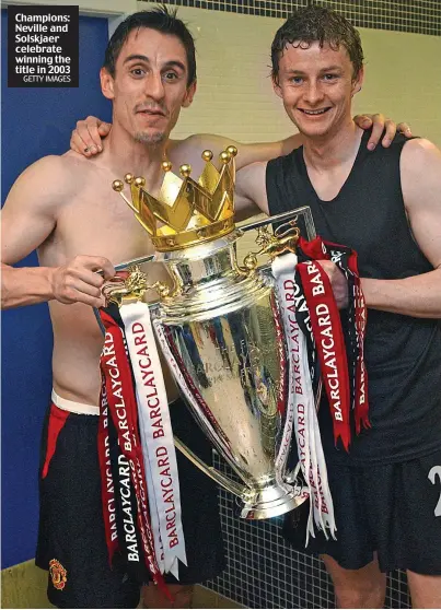  ?? GETTY IMAGES ?? Champions: Neville and Solskjaer celebrate winning the title in 2003