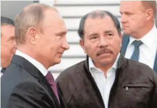  ?? // EFE ?? Ortega, con el presidente Putin, durante una visita a Moscú en 2014