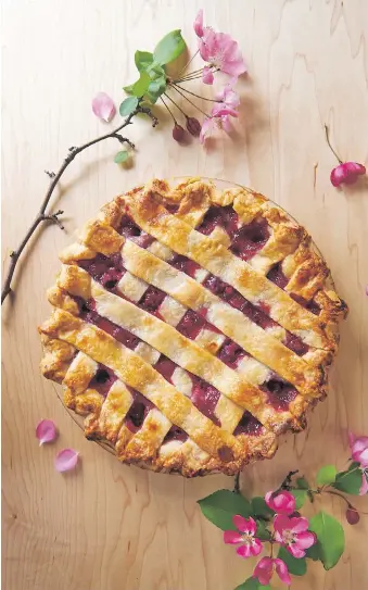  ?? AMANDA GALLANT/AG PHOTOGRAPH­Y ?? Inspired to make something special for those you love? Try pie! “It’s beautiful, easy and really lovely for Valentine’s Day,” Giselle Courteau says of the red-hued, lattice-topped treat.