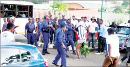  ?? (File pic) ?? A Mbabane Highlander­s supporter being brought under control by members of the Royal Eswatini Police after the match involving Mbabane Highlander­s and Young Buffaloes on Sunday at the Mavuso Sports Centre on Sunday.