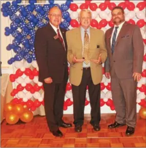  ?? VIRGINIA LINDAK – FOR DIGITAL FIRST MEDIA ?? Chamber Service Award recipient James “Hank” Hamilton, center, receives his Chamber Service award, an award that was renamed in his honor.