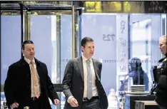  ?? SAM HODGSON / THE NEW YORK TIMES ?? Eric Trump (center) will stop soliciting contributi­ons for his charitable foundation, which supports the fight against childhood cancer, because of conflicts of interest he might face with donors trying for access to his father.